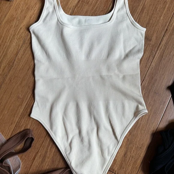 OQQ Women's 3 Piece Bodysuits Sexy
Ribbed Sleeveless Square Neck Tank Tops - Picture 6 of 10